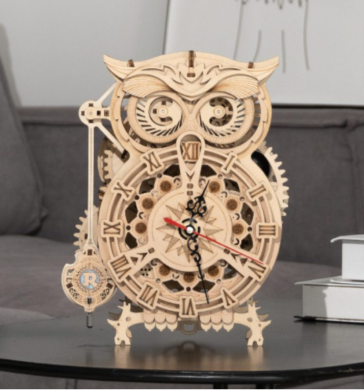 Gufo-orologio a pendolo