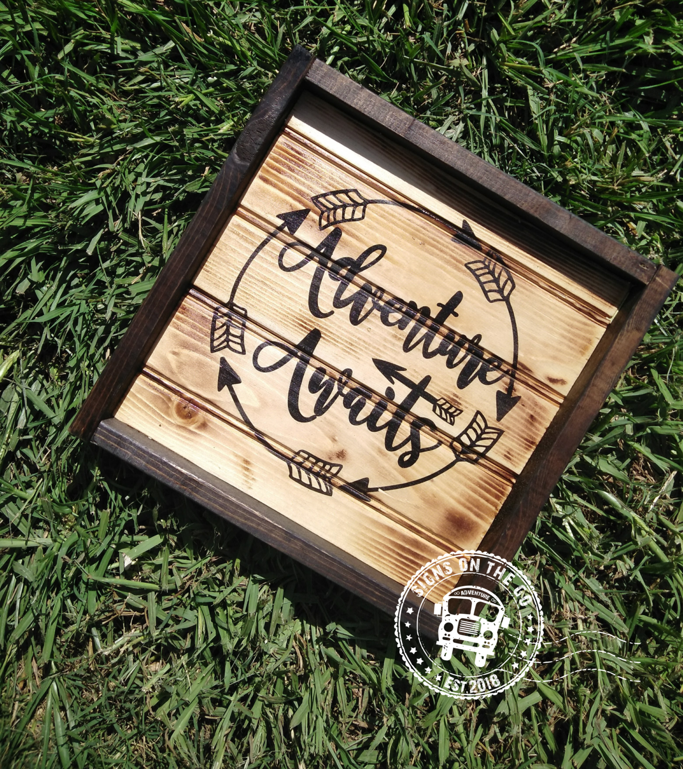 Adventure Awaits Sign