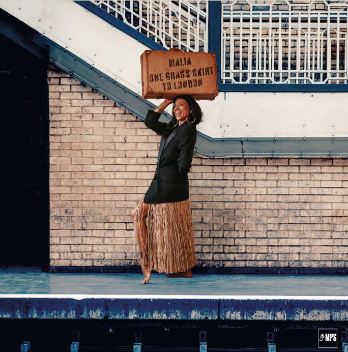 Malia 'One Grass Skirt to London'