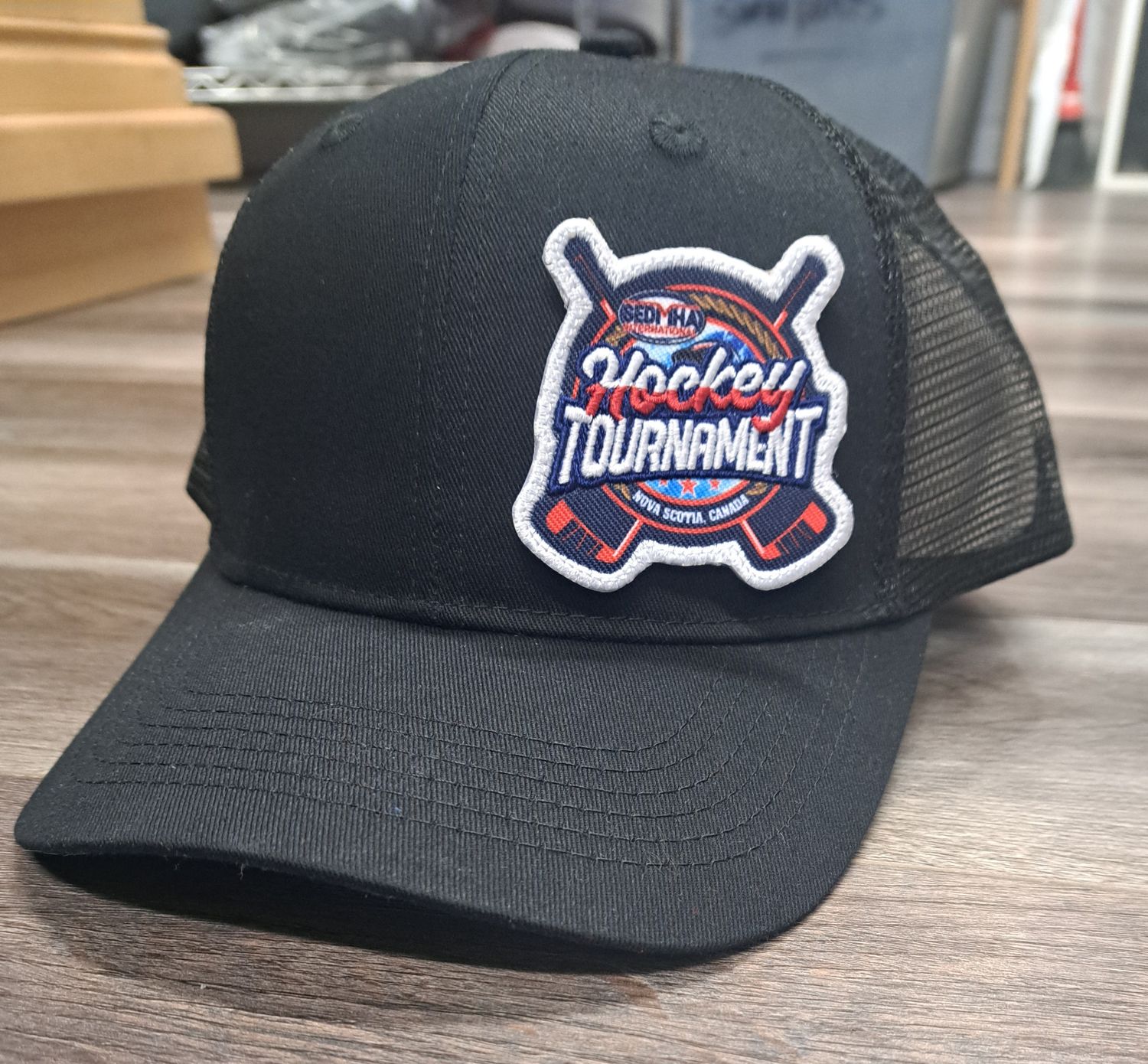 SEDMHA Minor Hockey Tournament - *ONLINE EXCLUSIVE* Black SEDMHA Minor Hockey Tournament Trucker Cap with Custom SEDMHA Patch