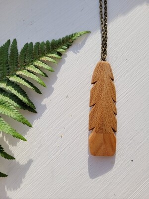 HUIA NATURALE - Hand Carved Wooden Pendant 