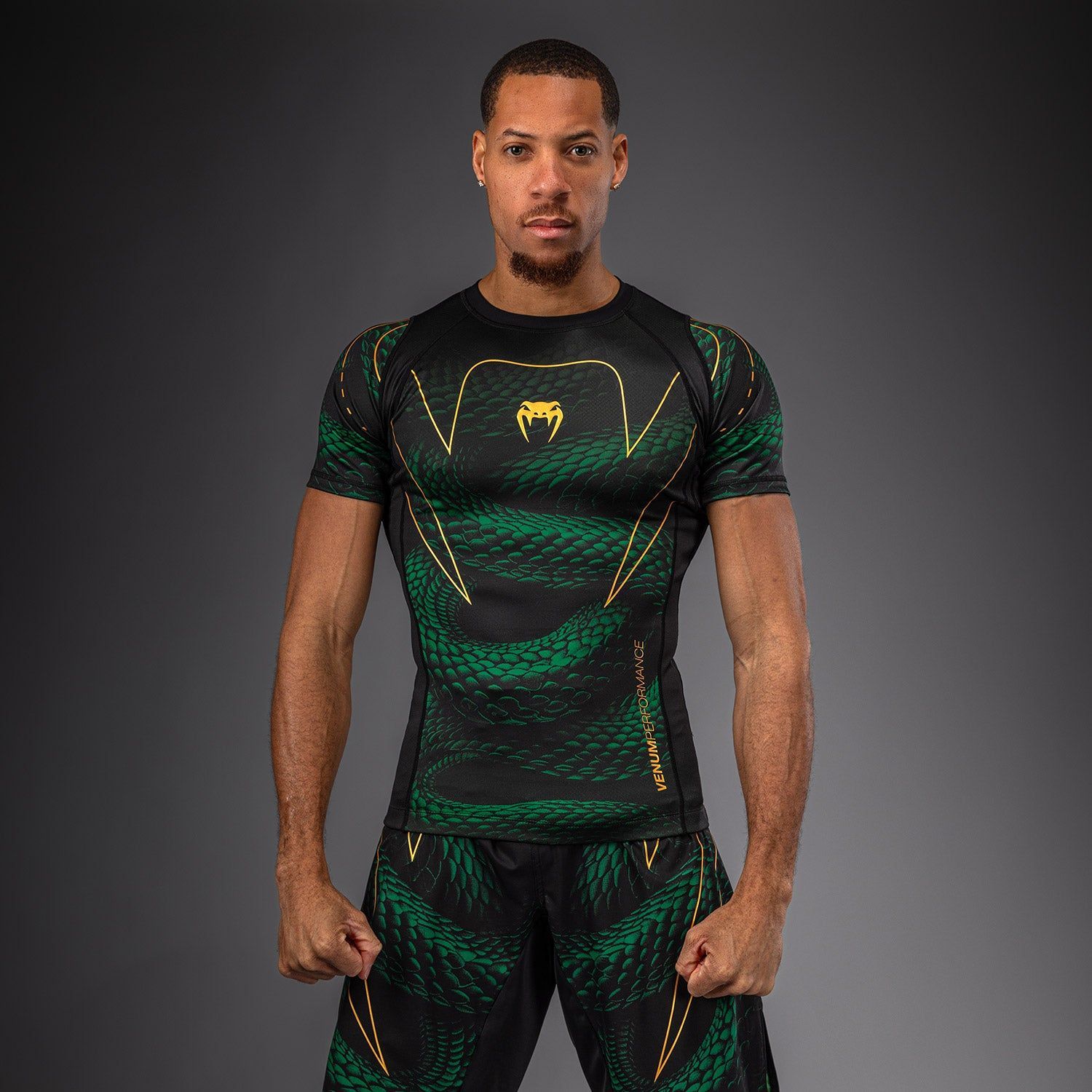 Venum Matupa Kurzarm-Rashguard Schwarz/Grün/Gold