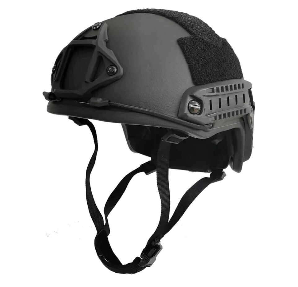 A lightweight black ballistic helmet designed for head protection in tactical operations, sized Medium/Large. The helmet features a streamlined, low-profile design with adjustable suspension and padding for a secure and comfortable fit. Built to meet ballistic standards, it provides protection against handgun threats while maintaining maximum mobility and reduced fatigue. Ideal for military, law enforcement, and security personnel.