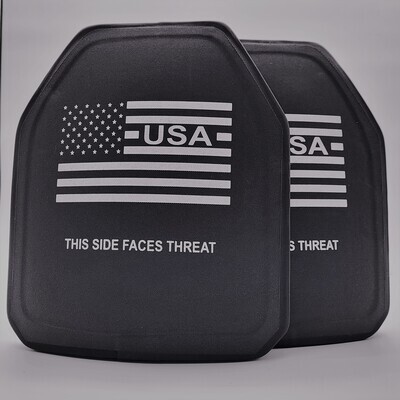 A black Level IV ballistic armor plate designed to stop armor-piercing rifle rounds, offering the highest level of personal protection. The plate features a sleek, multi-curve design for a comfortable fit, along with clearly marked text reading &#39;THIS SIDE FACES THREAT&#39; and a white American flag graphic. Built for tactical professionals, law enforcement, and prepared civilians, this stand-alone plate delivers maximum stopping power in a lightweight, durable construction.