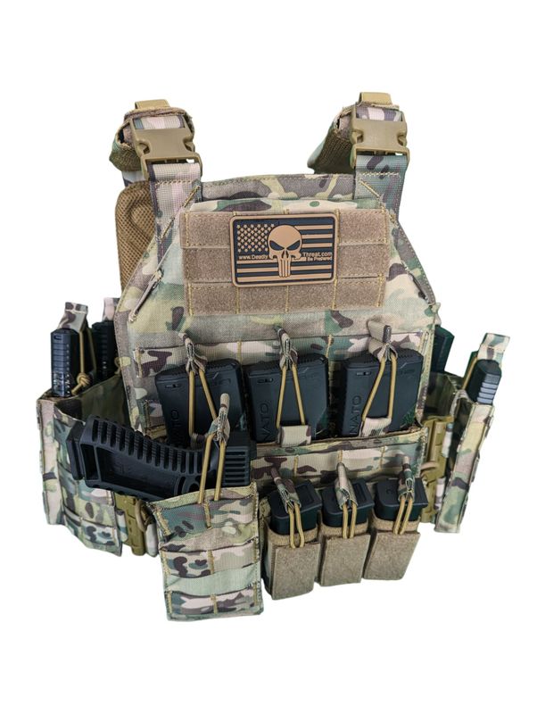 Urban Assault tactical plate carrier in Camo 7 camo pattern with MOLLE webbing, adjustable shoulder and waist straps, and lightweight durable construction. Compatible with front, back, and side armor plates. Ideal for military, law enforcement, and tactical gear setups in woodland and mixed-terrain environments.