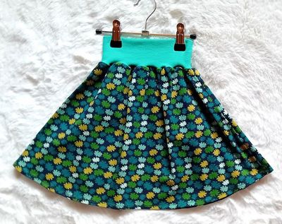 Kinderrock Tellerrock BLUMENSTECKER in Gr. 110/116