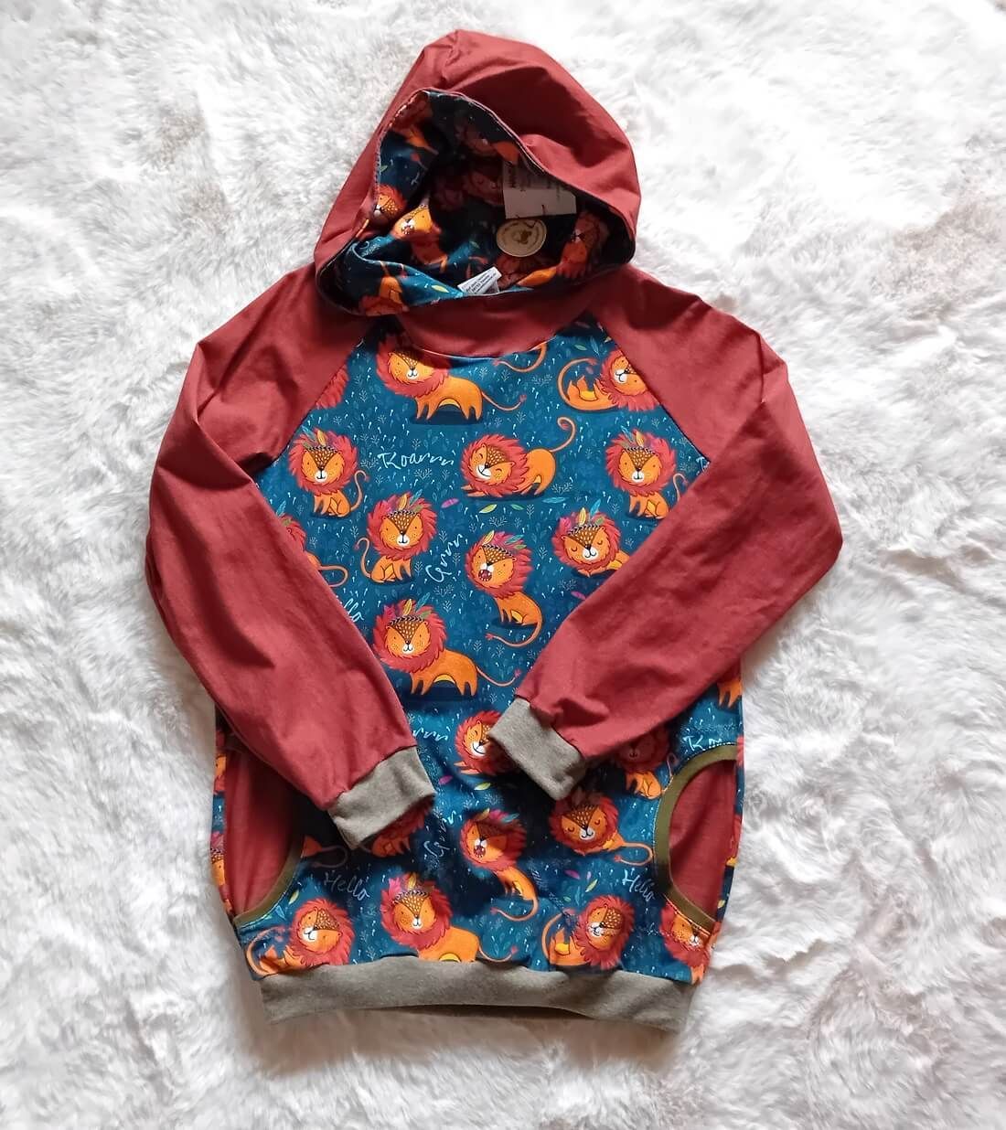 Kapuzenpullover Jungen LION KING in Gr. 134