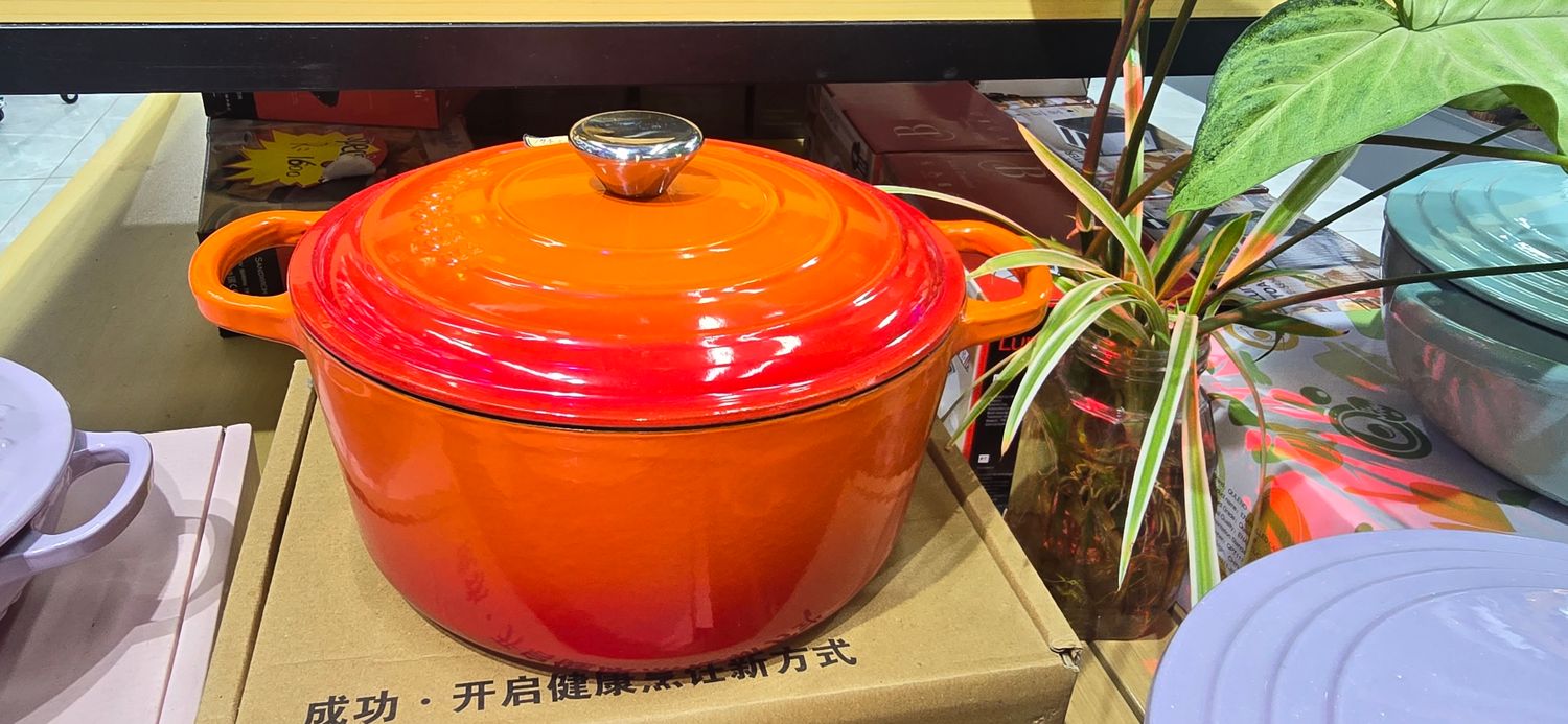ORANGE CAST IRON CASSEROLE DISH