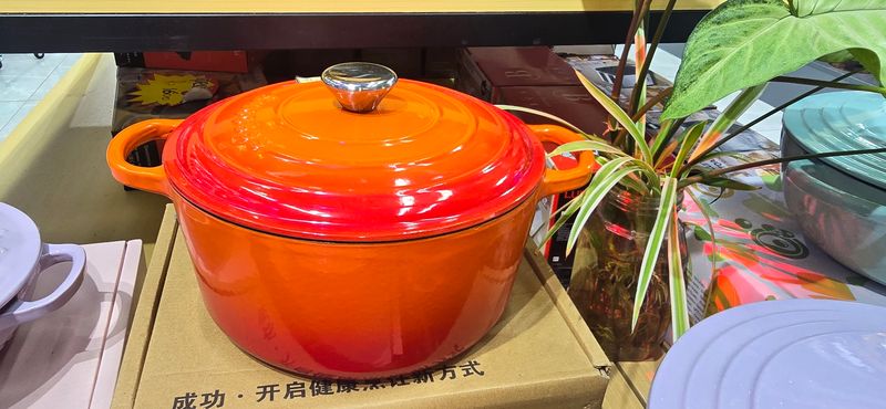 ORANGE CAST IRON CASSEROLE DISH