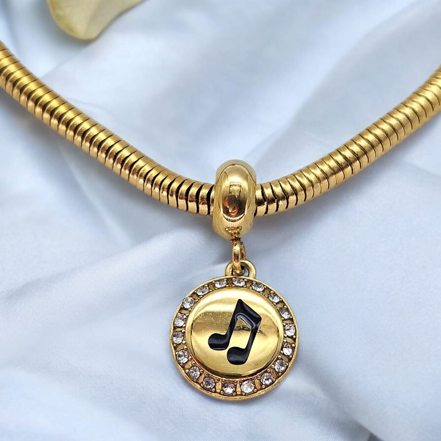 CHARMS NOTA MUSICAL DORADO