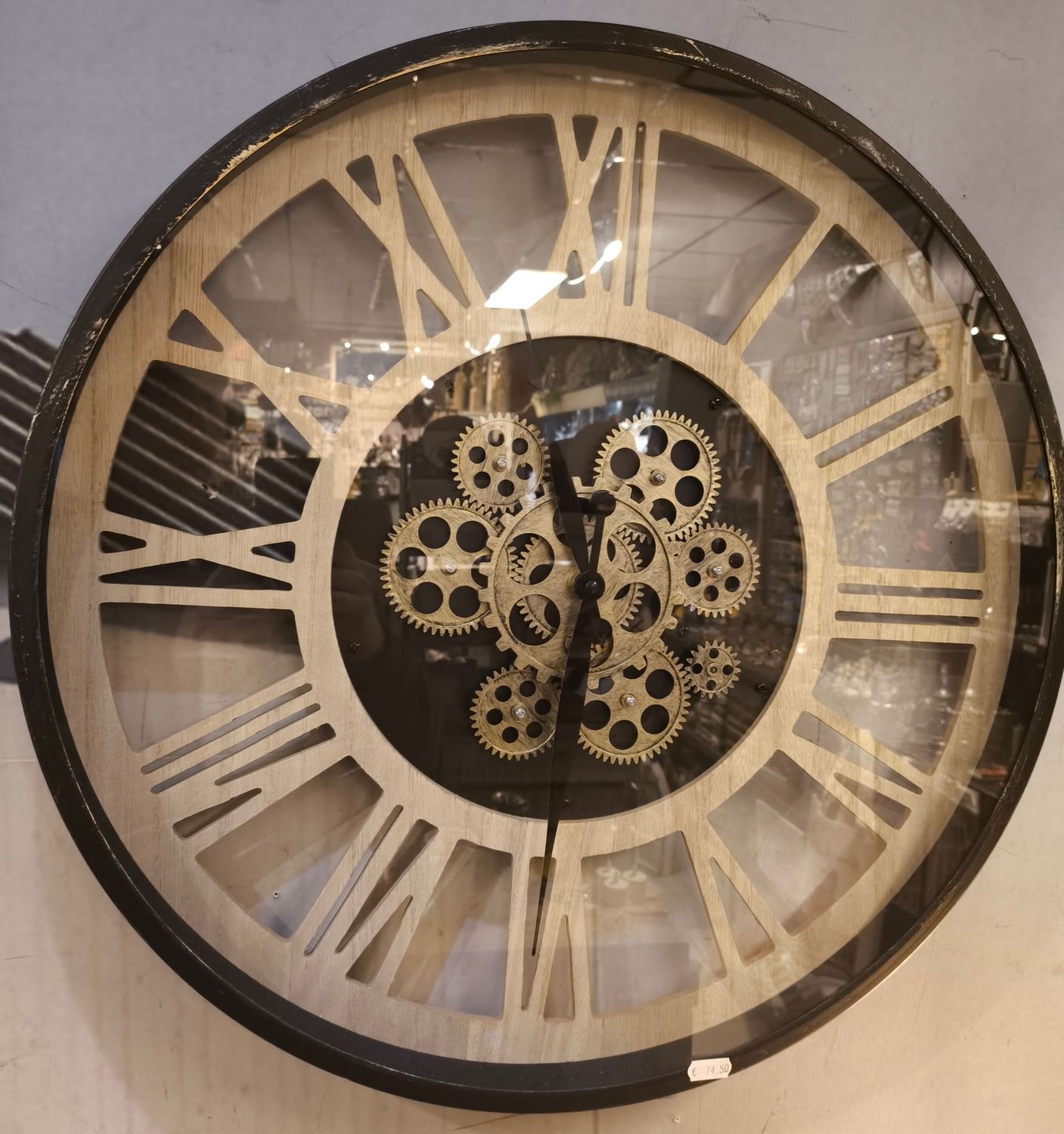 Wandklok metaal/hout met gouden roterende tandwielen Wandklok metaal/hout met gouden roterende tandwielen