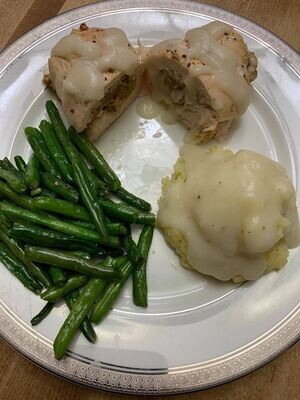 Stuffed Chicken Breast with Mashed Potatoes and Gravy (plus 1 side)