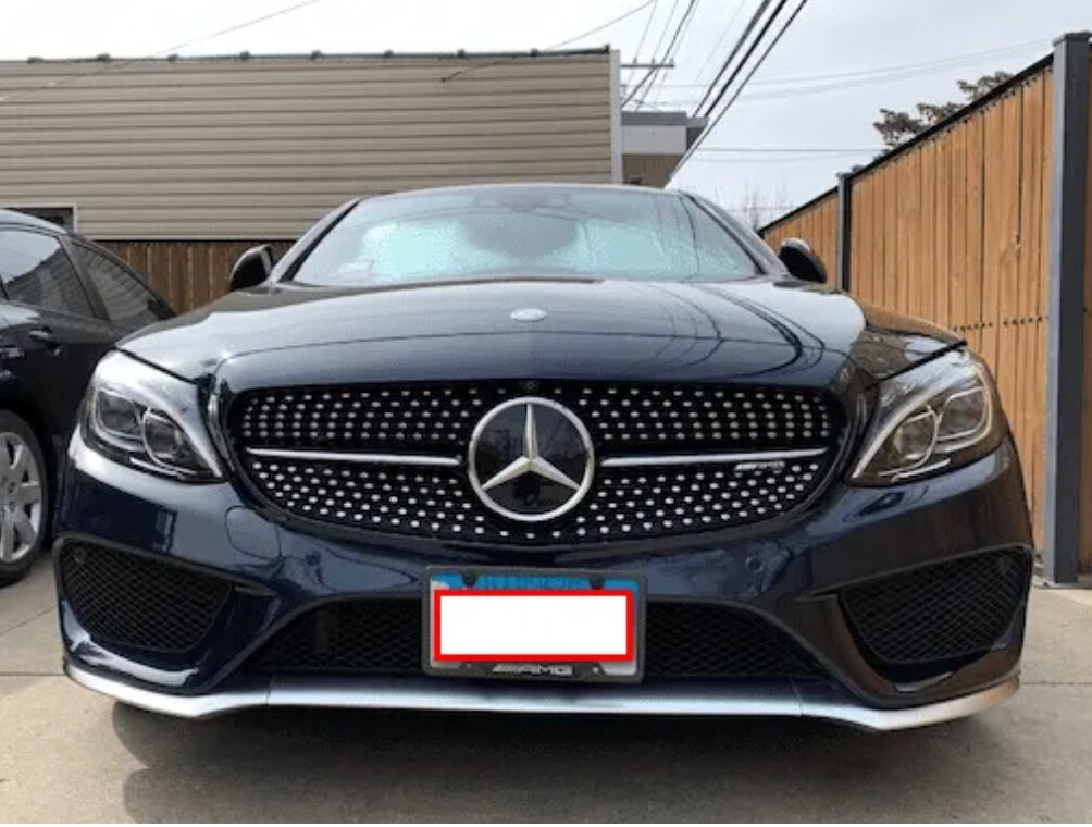Sly Bracket for Mercedes-Benz models with mesh lower grille.