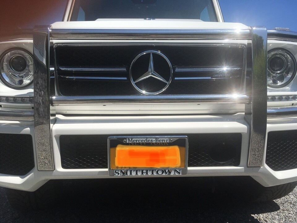 Sly Bracket for Mercedes-Benz models with mesh lower grille.