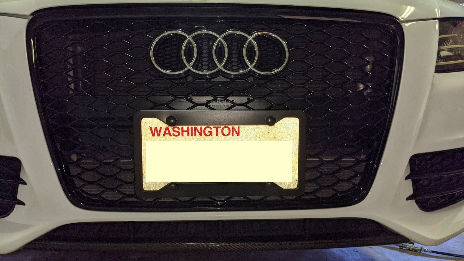Sly Bracket for Audi featuring a mesh-style lower grille.
