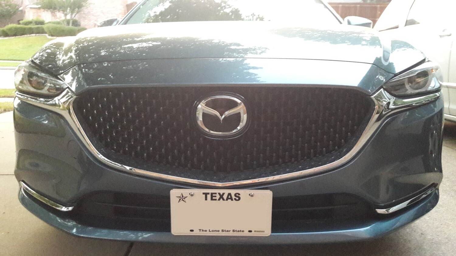 Sly Bracket fits Mazda models with horizontal slats the lower grille.