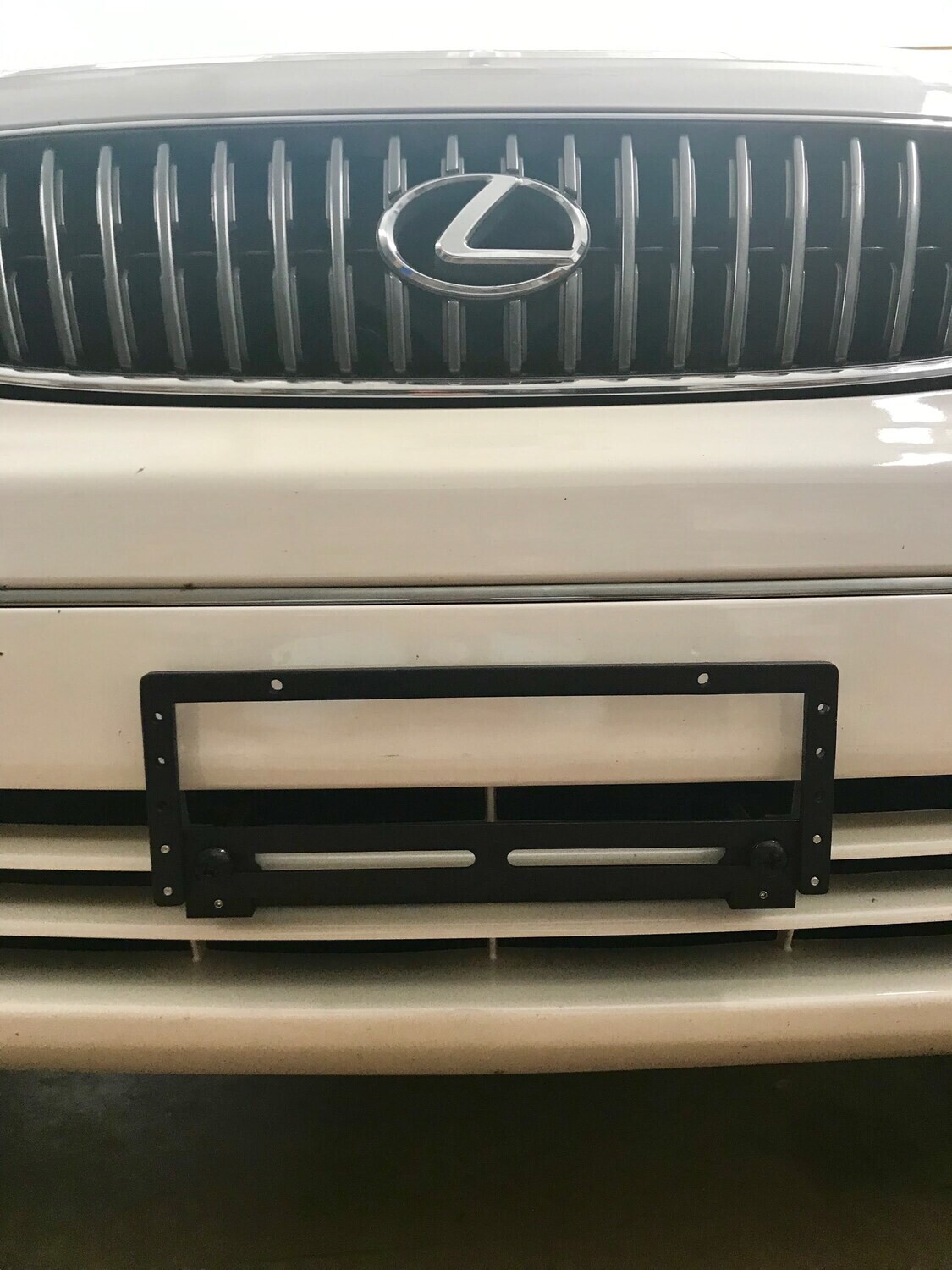 Sly Bracket fits Lexus models with horizontal slat lower grille.