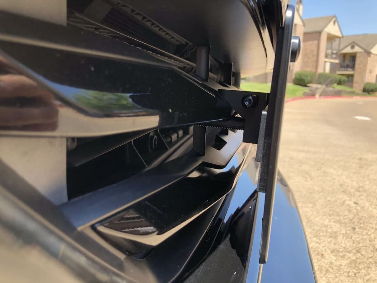 Sly Bracket fits Chevrolet models with horizontal slat lower grille.