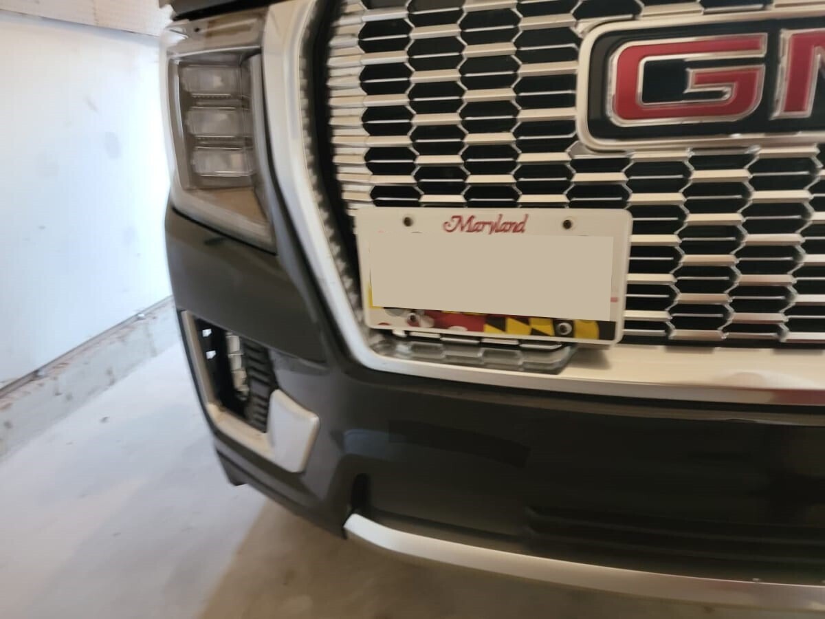 Sly Bracket for GMC models with mesh-style grille.