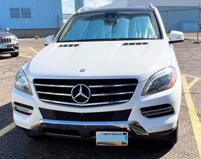 Sly Bracket for Mercedes-Benz models with mesh lower grille.