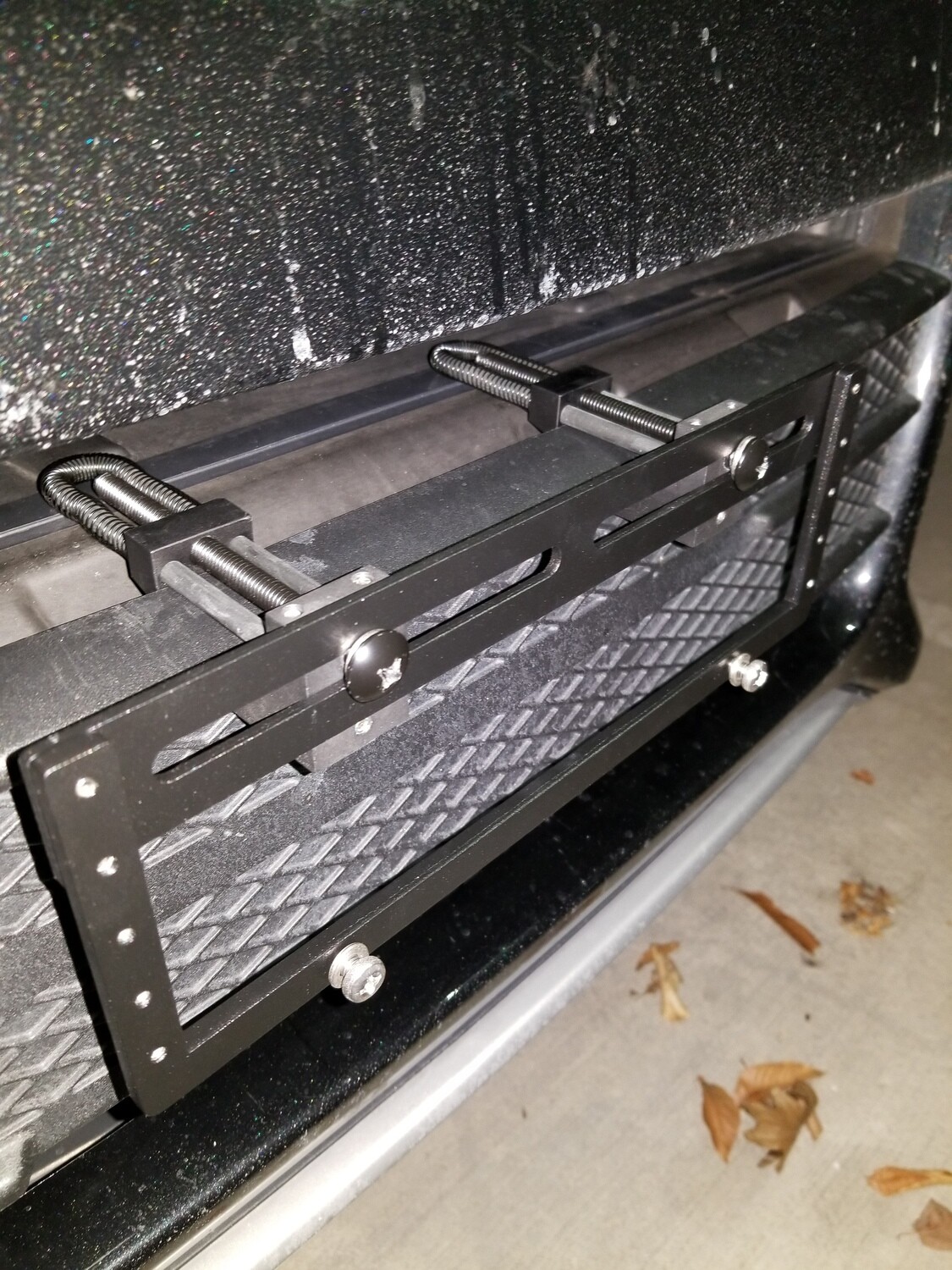 Sly Bracket fits Ford models with horizontal slat lower grille.