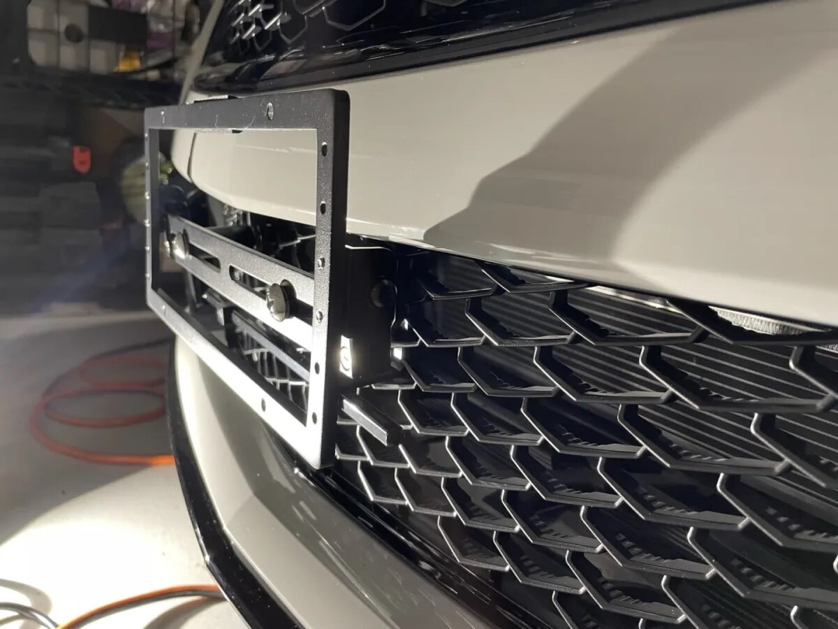 Sly Bracket for Cadillac with mesh lower grille.