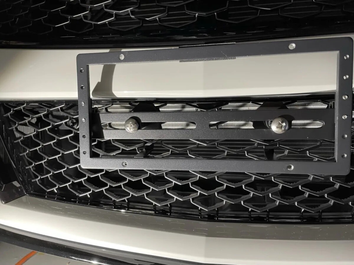 Sly Bracket for Cadillac with mesh lower grille.