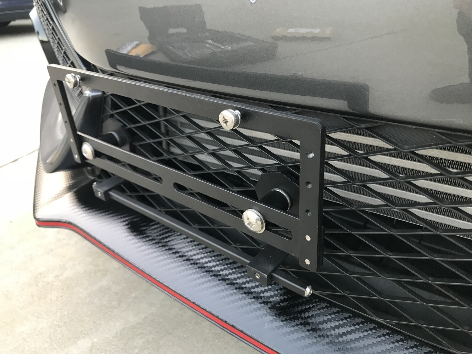 Sly Bracket for Honda Civic with mesh-style lower grille.
