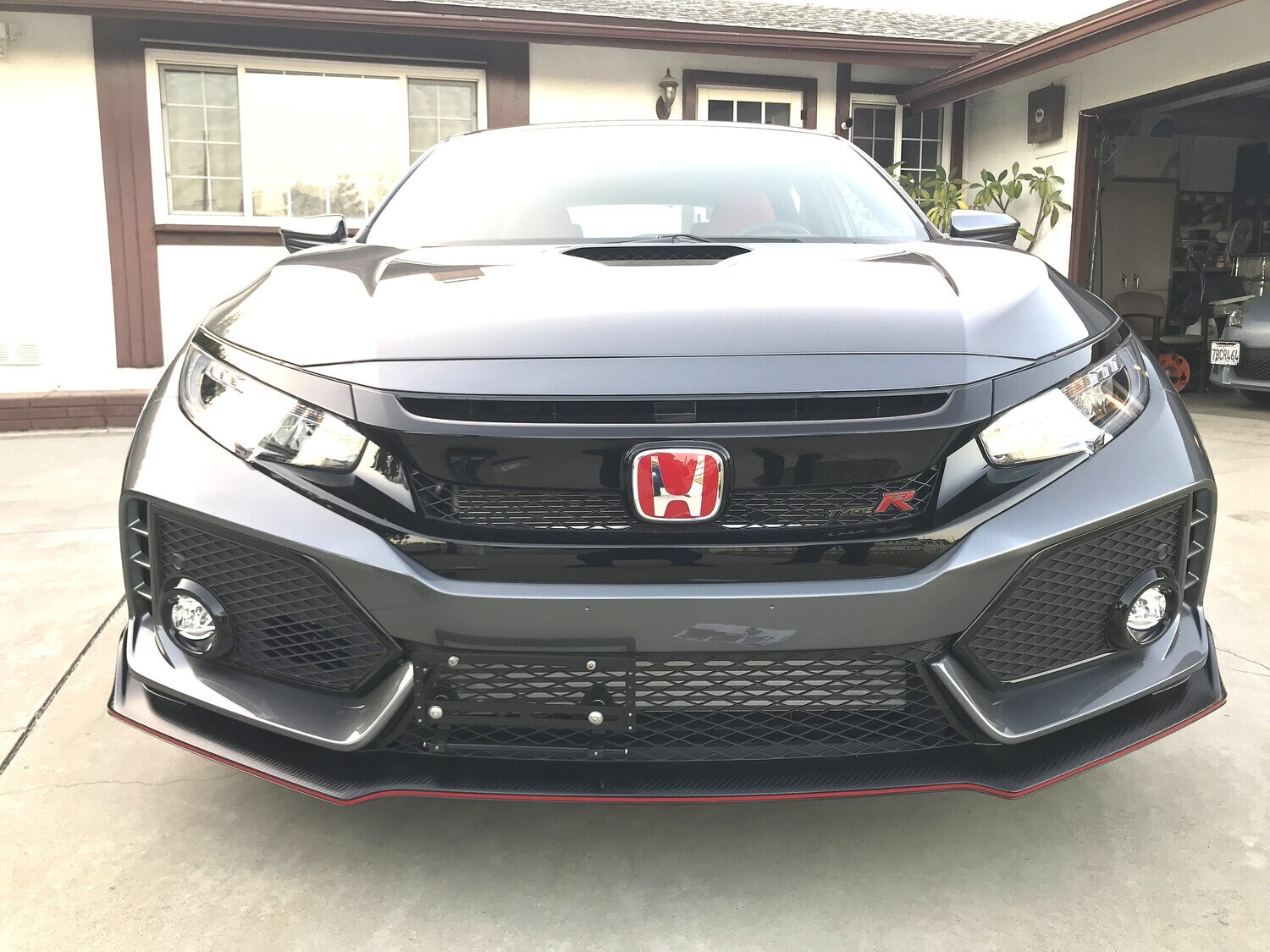 Sly Bracket for Honda Civic with mesh-style lower grille.