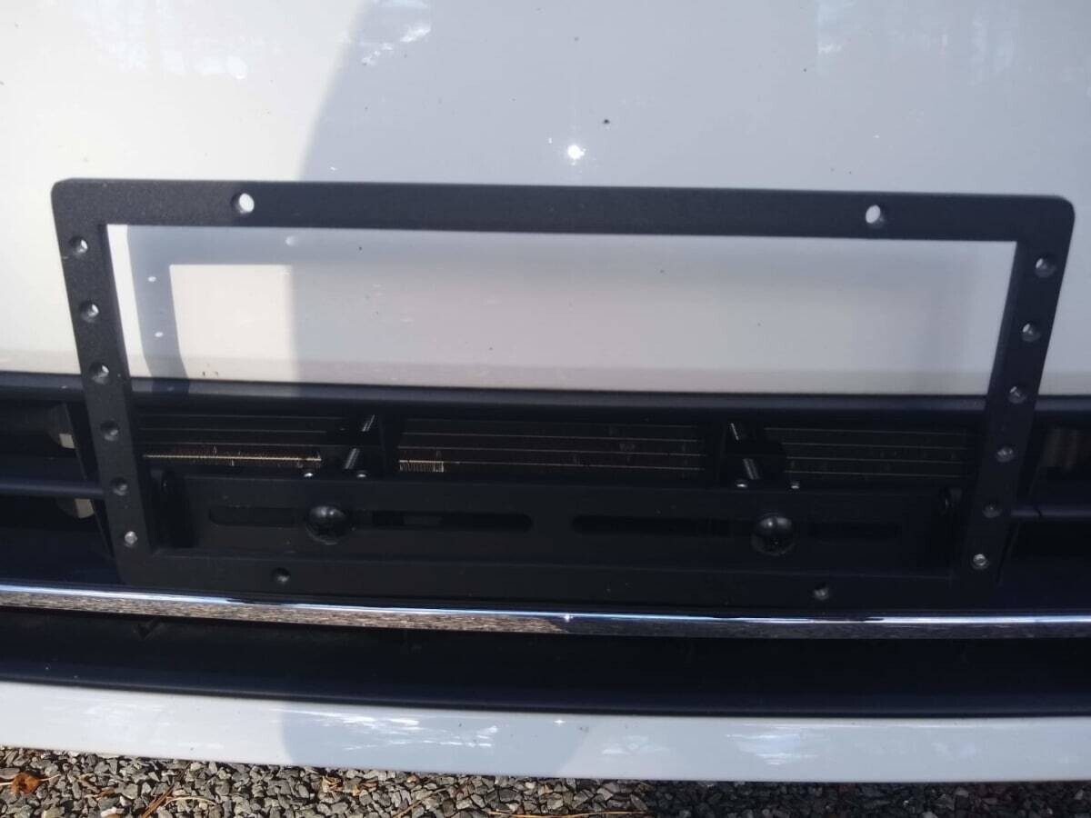 Sly Bracket fits Volkswagen Passat with horizontal or vertical slats lower grille.