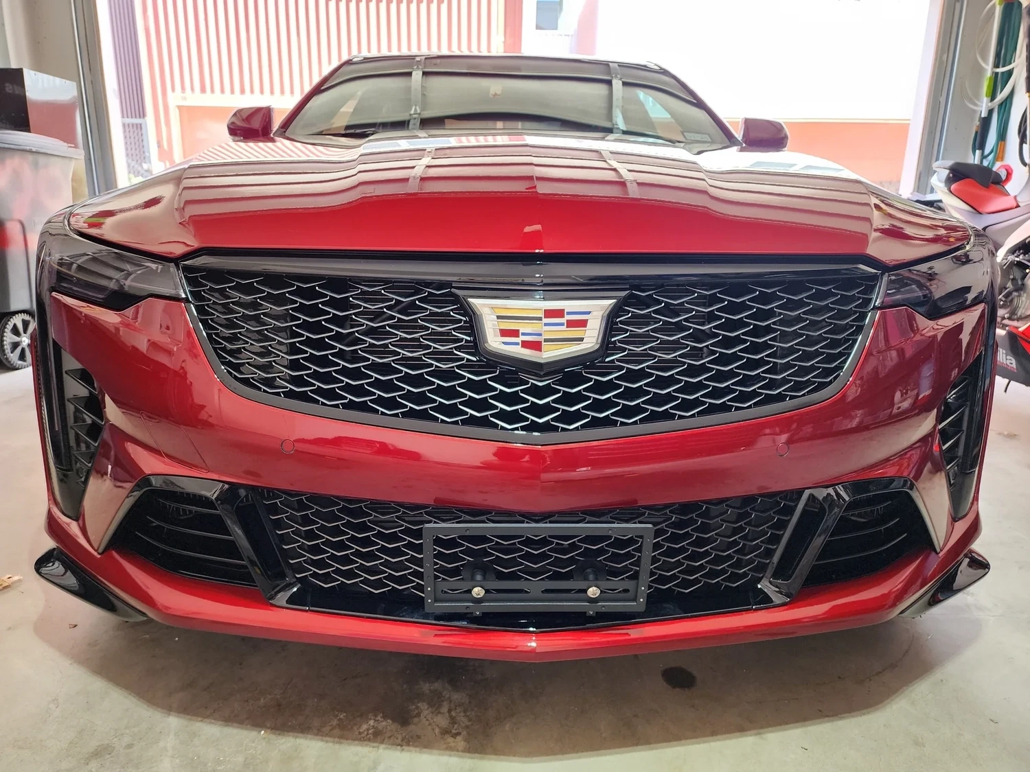 Sly Bracket for Cadillac with mesh lower grille.