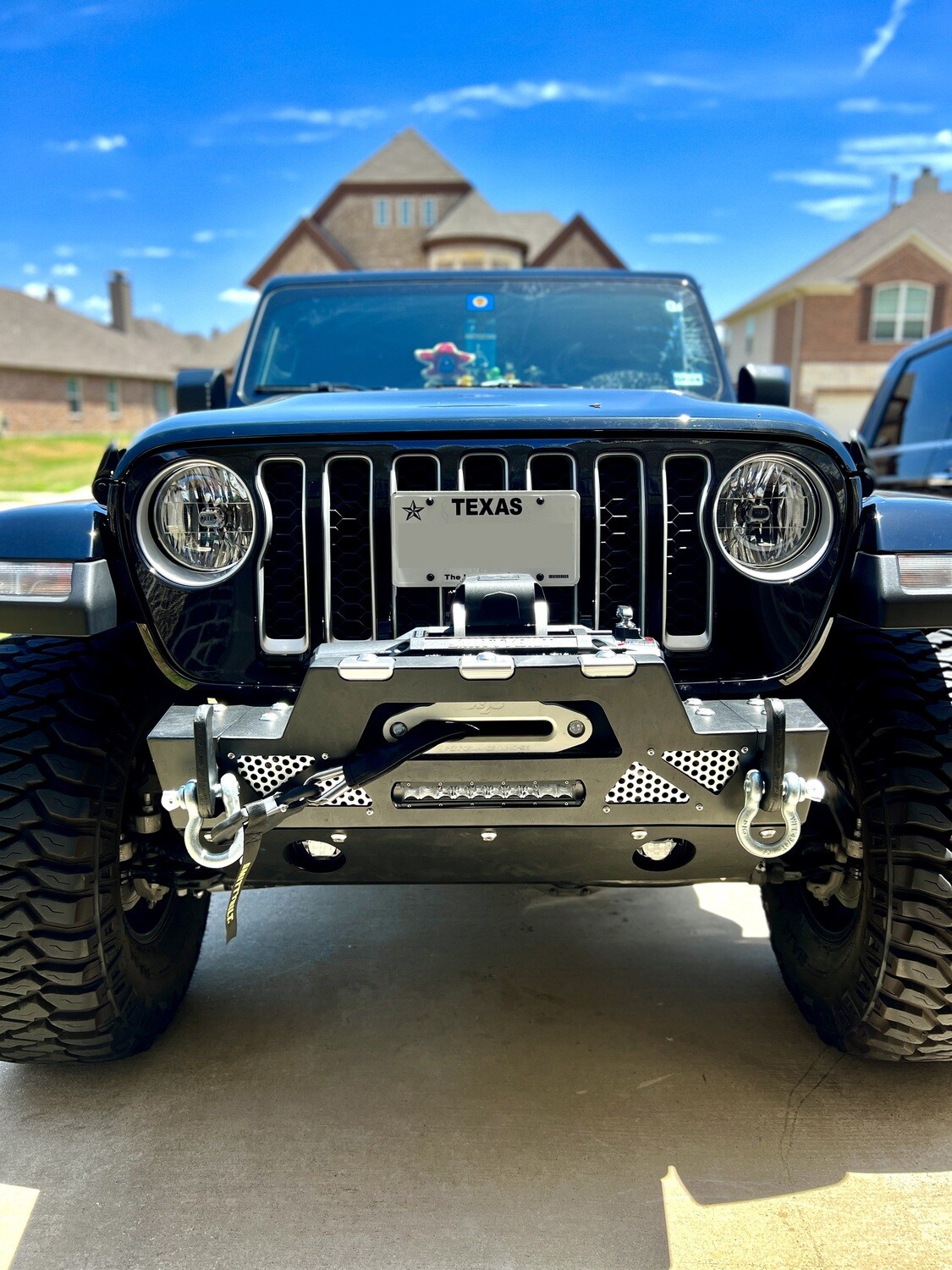 Sly Bracket for Jeep Gladiator Overland with mesh-style lower grille.
