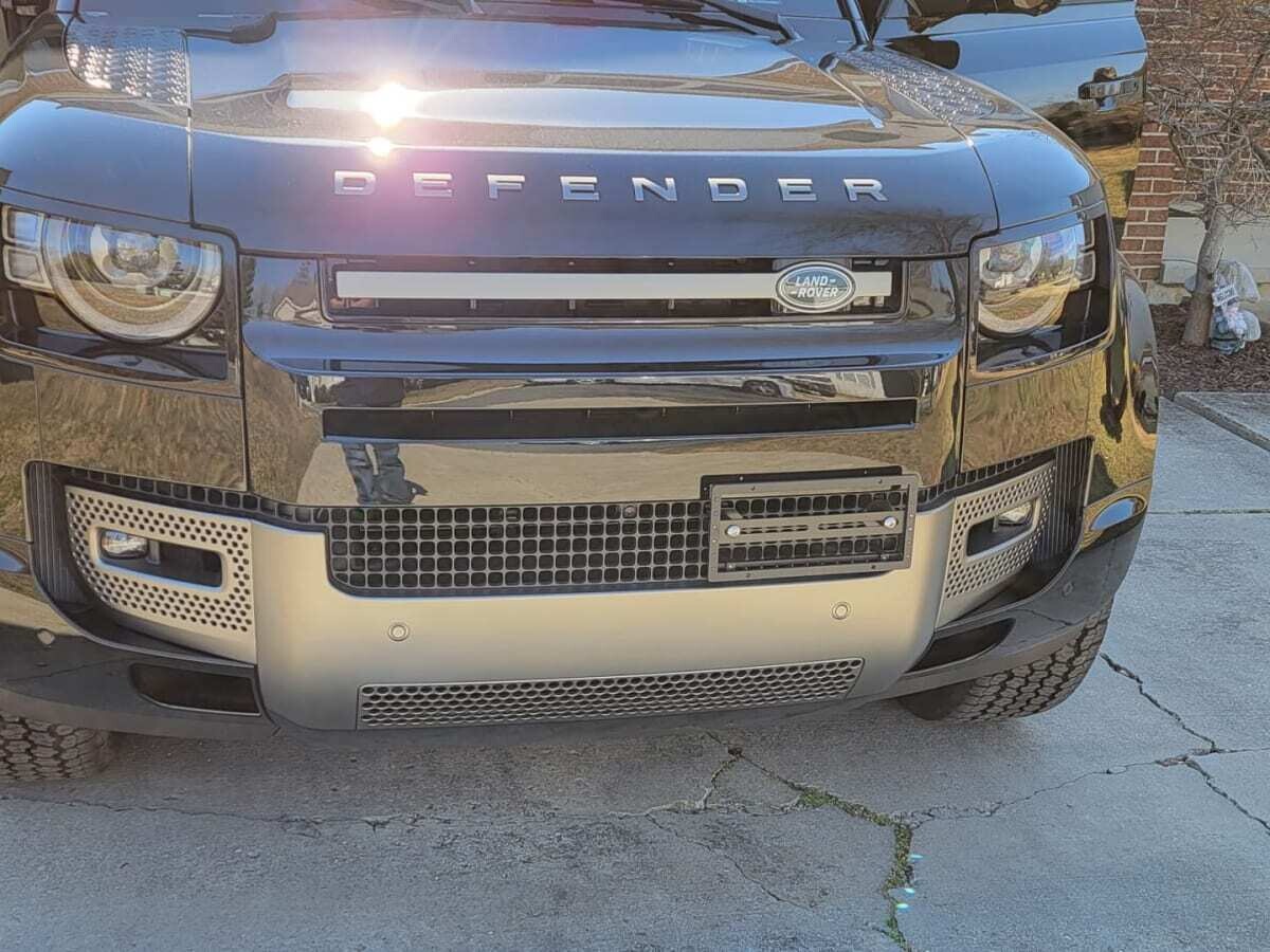 Sly Bracket for Land Rover Defender with mesh grille.