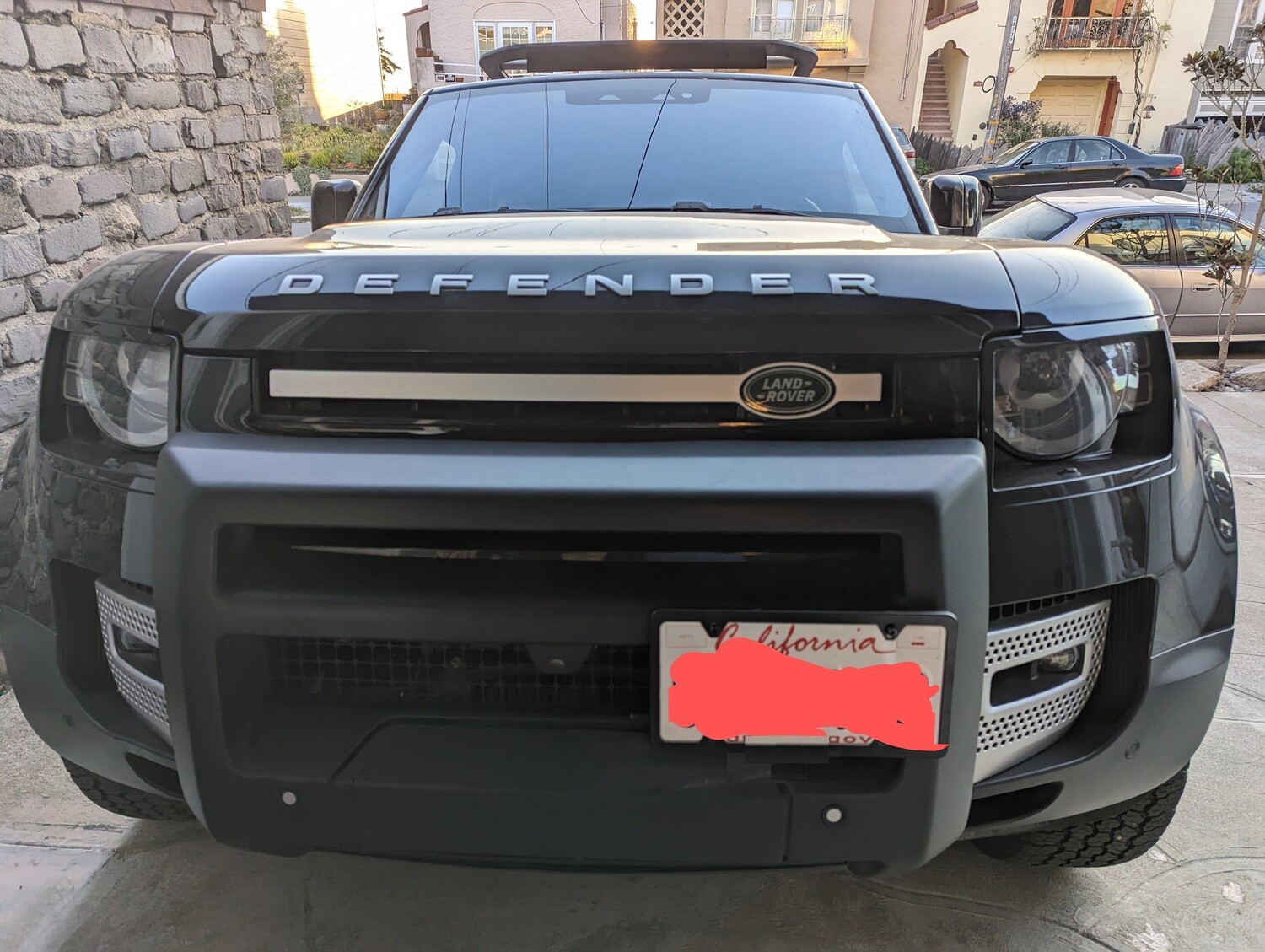 Sly Bracket for Land Rover Defender with mesh grille.