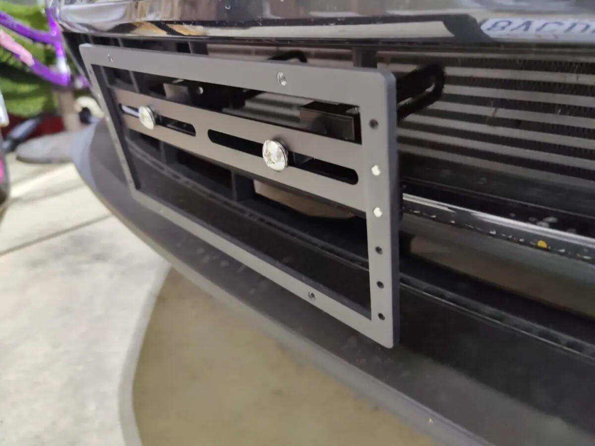 Sly Bracket fits 2016-2021 Porsche Macan with two center vertical slats lower grille.