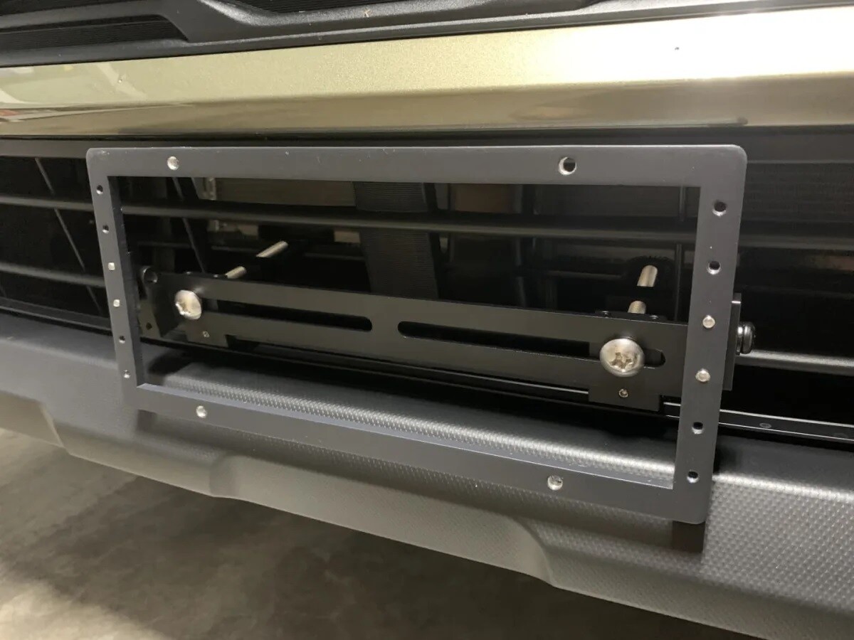 Sly Bracket fits Subaru Outback with horizontal slats lower grille.