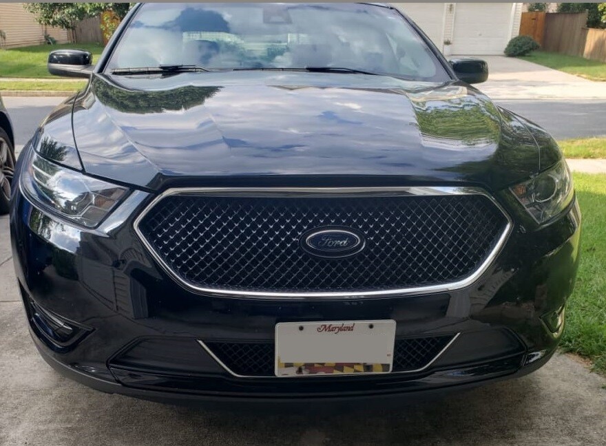 Sly Bracket for Ford Taurus with mesh-style lower grille.