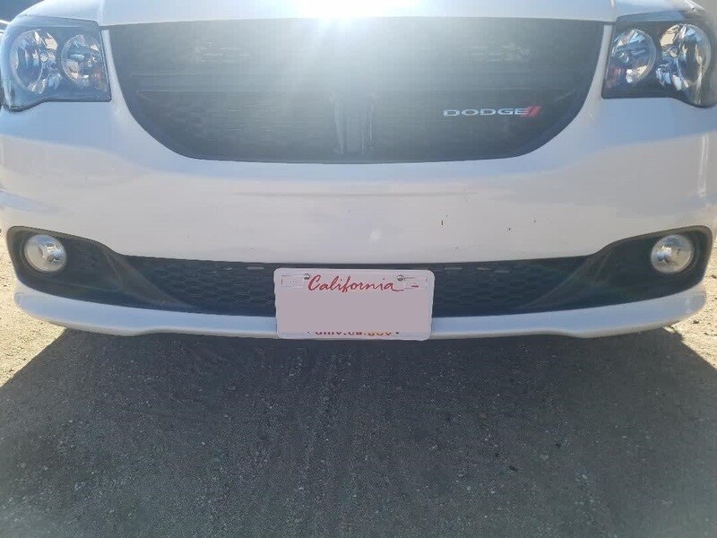 Sly Bracket for Dodge Grand Caravan with mesh-style lower grille.