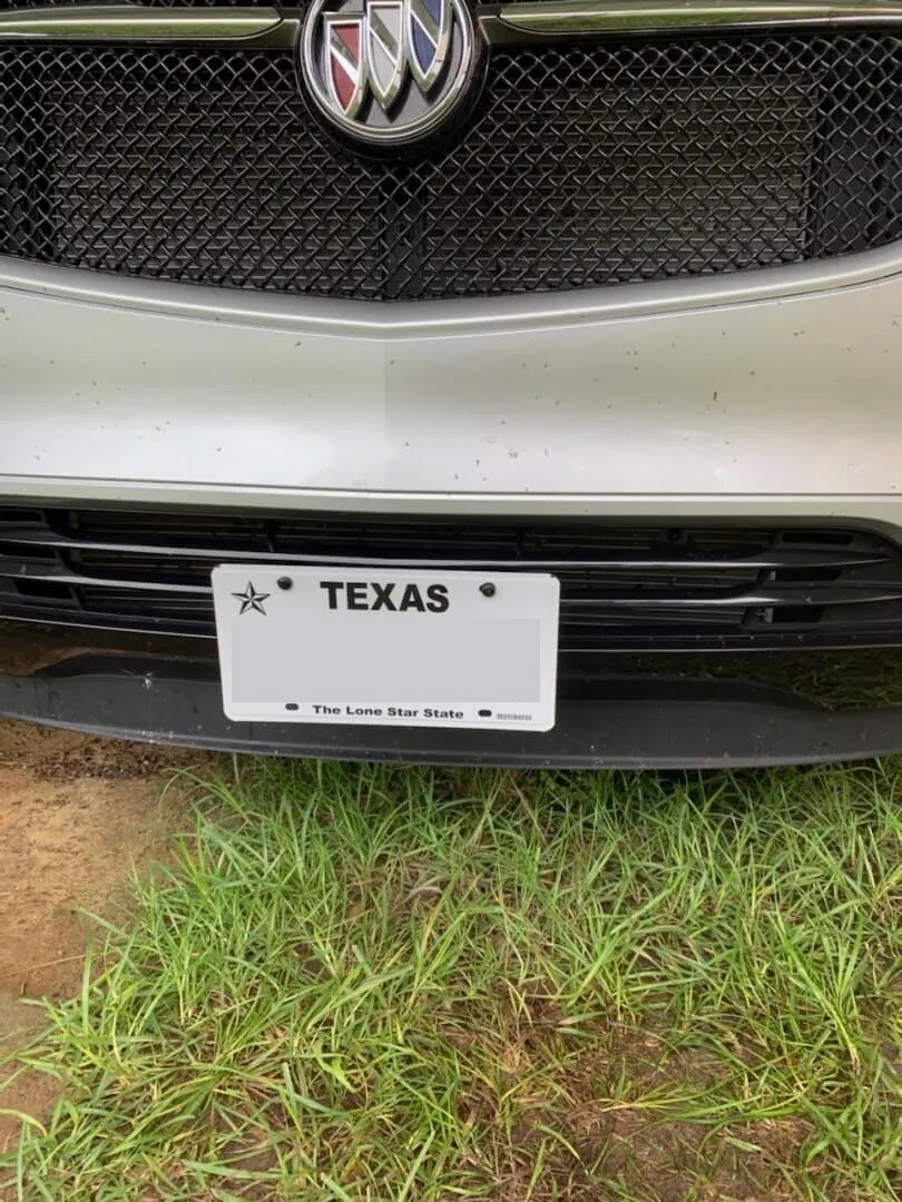 Sly Bracket for Buick Enclave with horizontal slats lower grille.