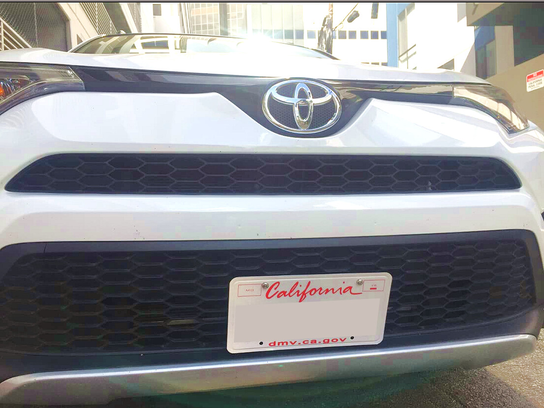 Sly Bracket for Toyota RAV4 with a mesh-style lower grille.