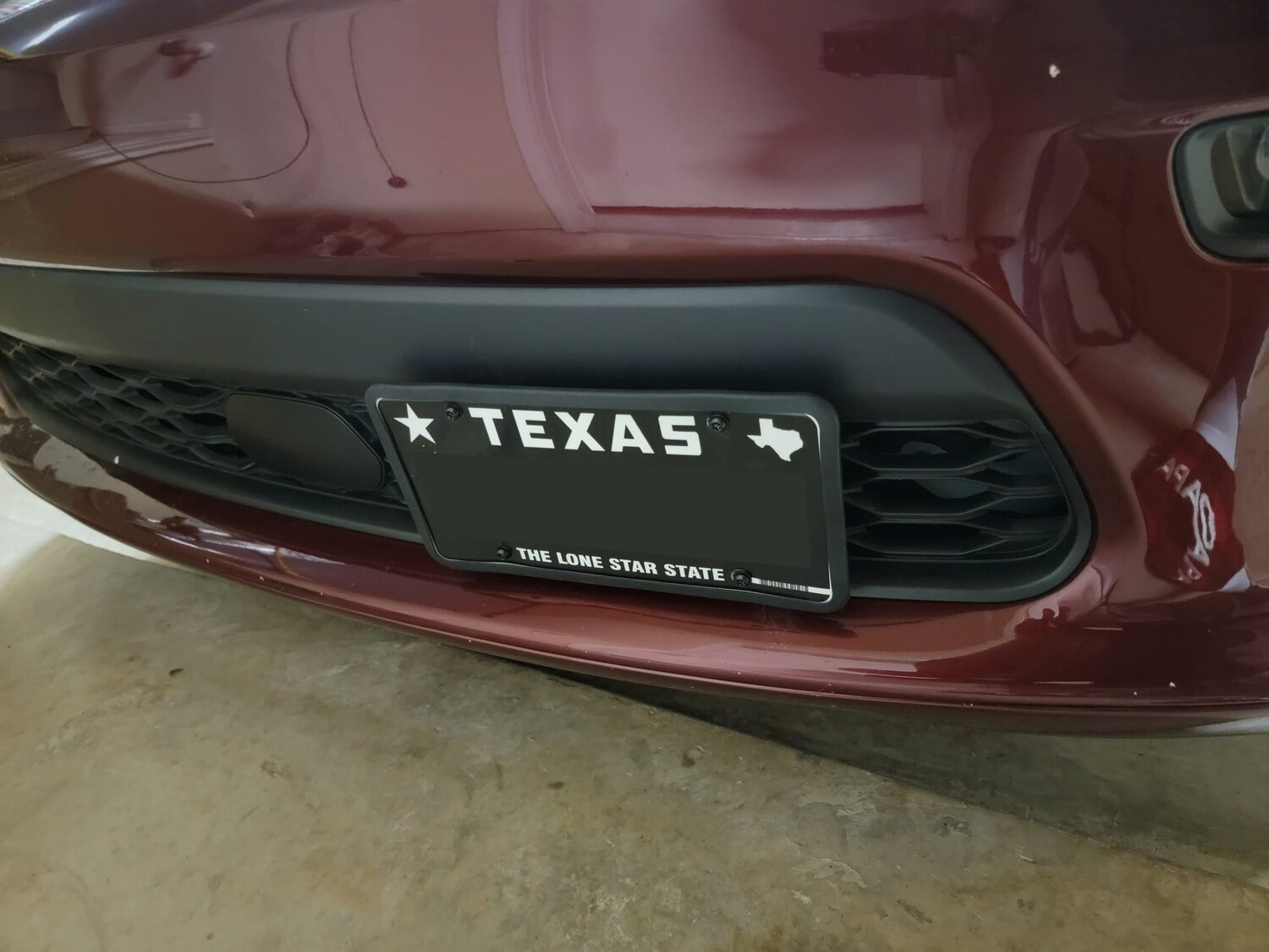 Sly Bracket for Dodge Durango with mesh-style lower grille.