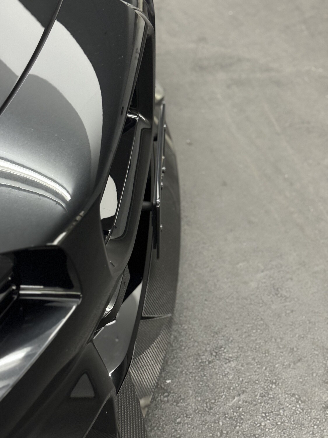 Sly Bracket fits 2024 BMW M2 G87 with vertical slats lower grille.