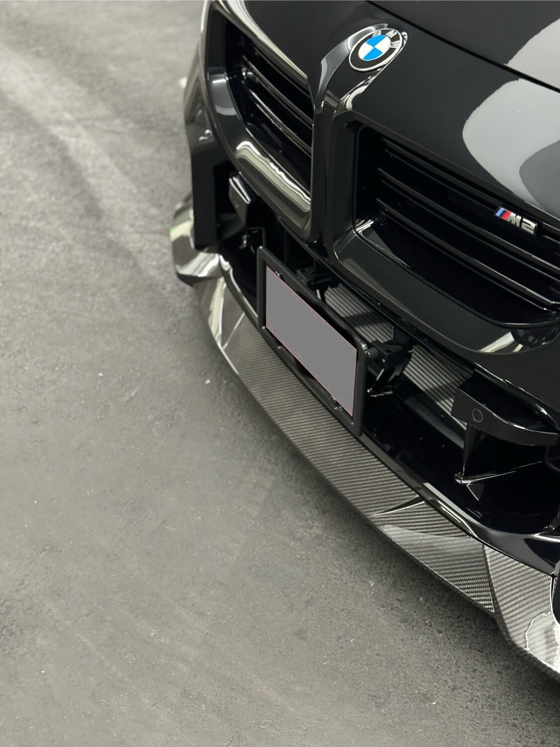 Sly Bracket fits 2024 BMW M2 G87 with vertical slats lower grille.