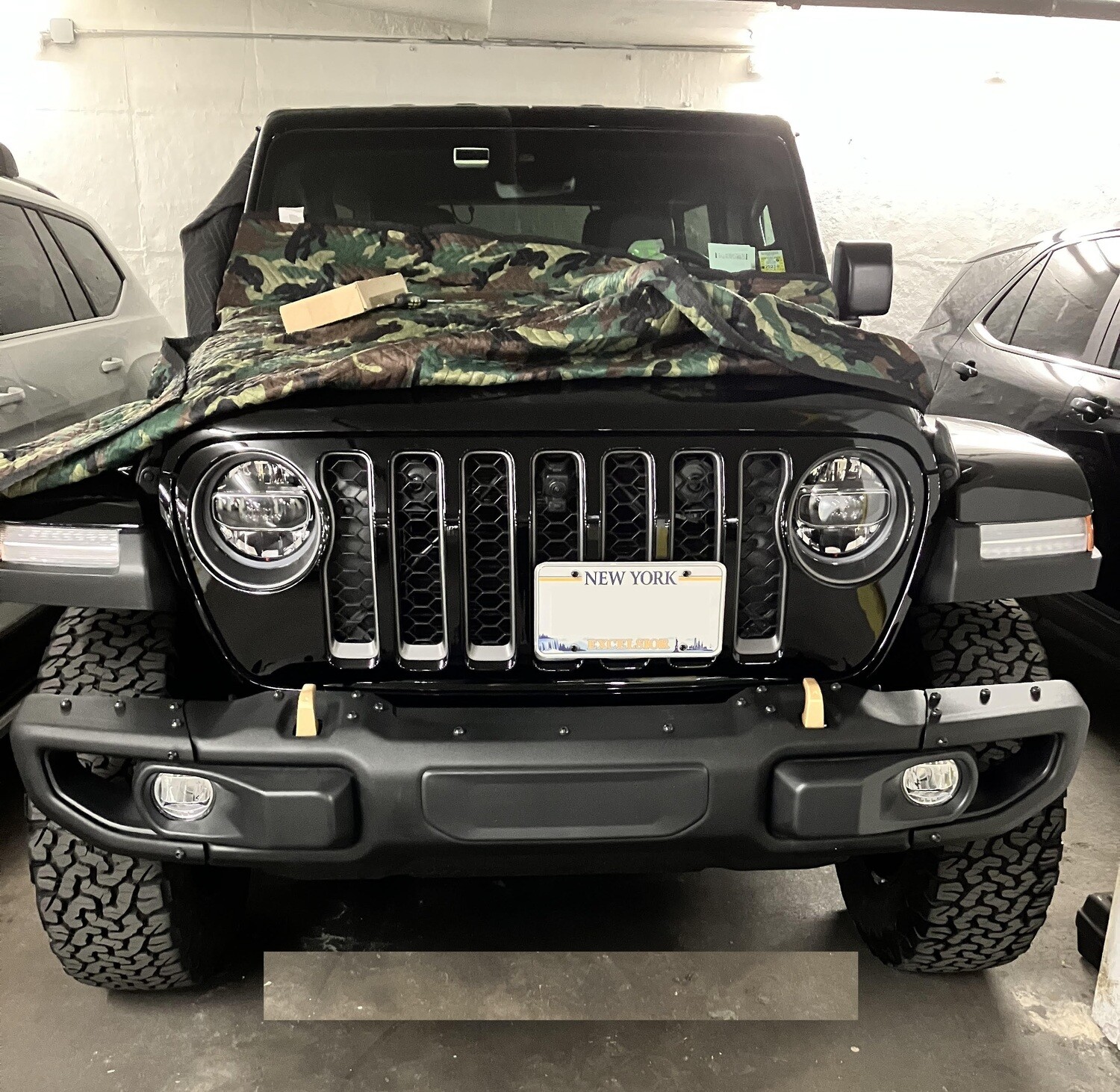 Sly Bracket fits Jeep Wrangler with mesh grille.