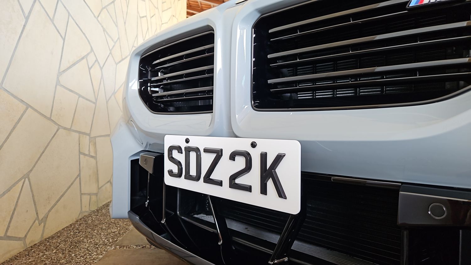 Sly Bracket fits 2024 BMW M2 G87 with vertical slats lower grille.