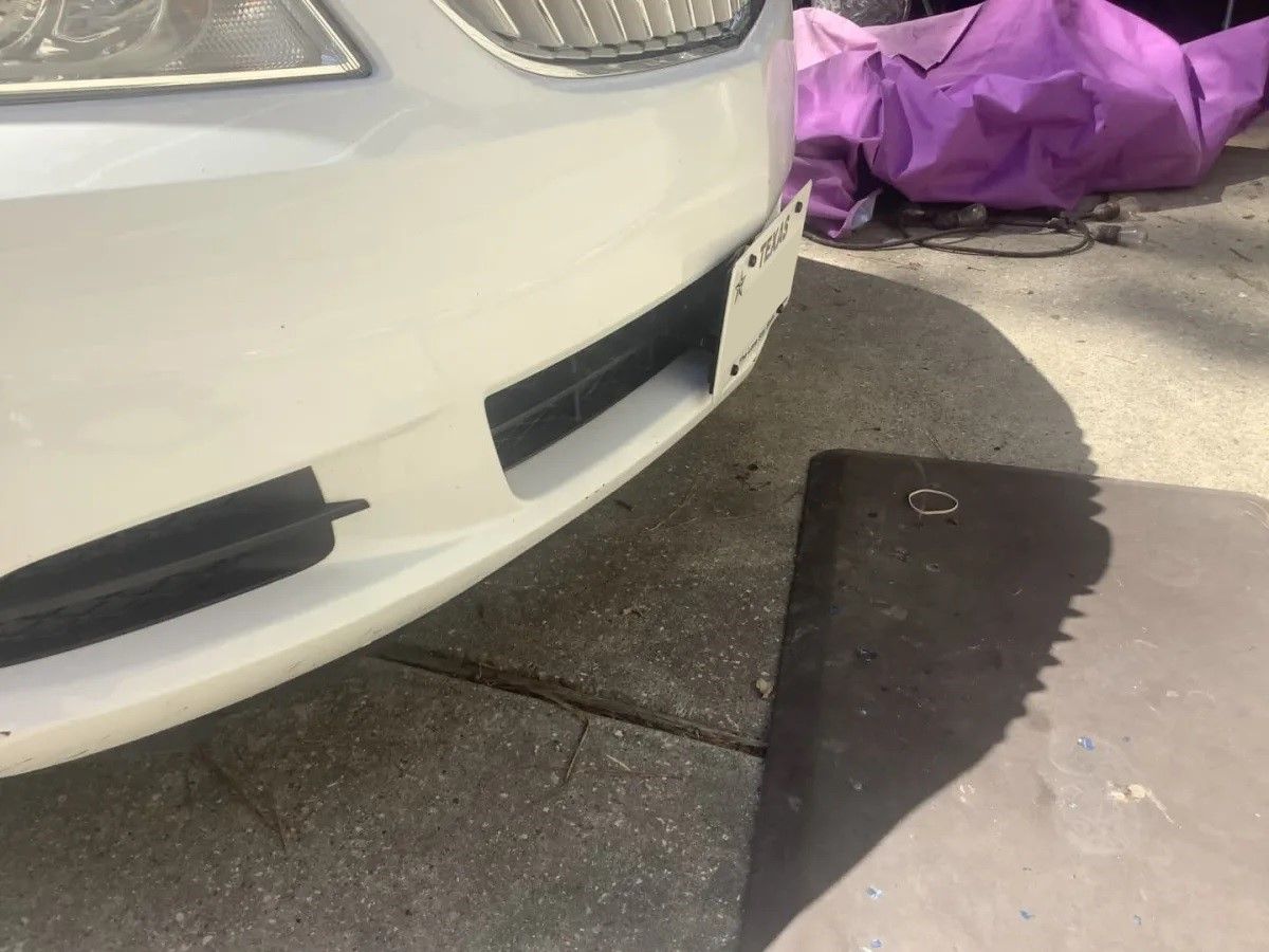 Sly Bracket for 2010-2013 Buick Lacrosse with mesh and horizontal slat lower grille.