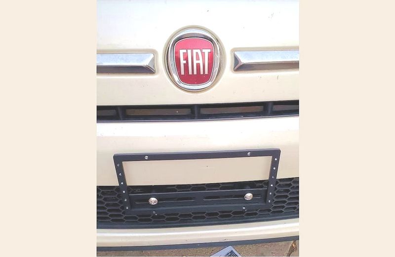 License Plate Bracket for Fiat 500 with mesh-style lower grille.