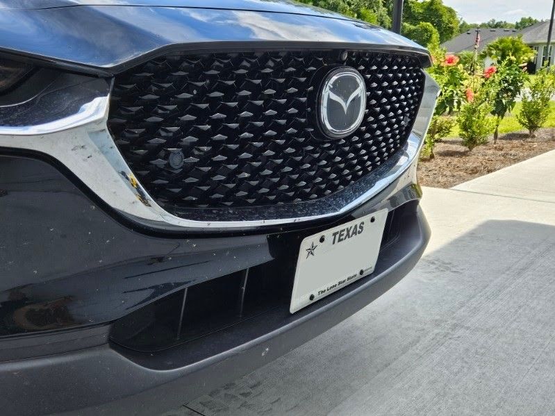 Sly Bracket fits Mazda models with horizontal slats the lower grille.