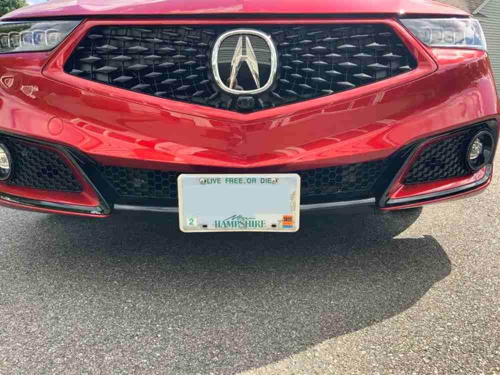 Sly Bracket for Acura TLX with a mesh-style lower grille.