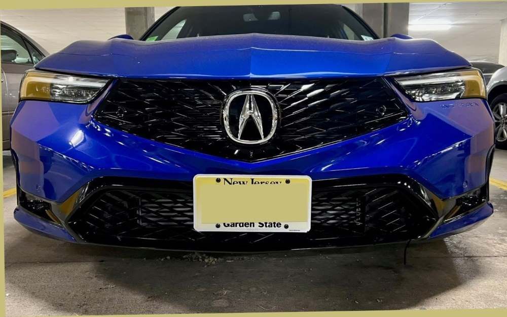 Sly Bracket for Acura Integra with a mesh-style lower grille.